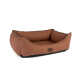 Braunes rechteckiges Tierbett mit erhöhten Seiten und einem kleinen Etikett mit der Aufschrift "Trixie Dog" vorne.
