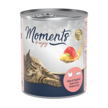 Cat food can with a label reading "Moments to enjoy," featuring a cat lounging beside a fork with chicken and tuna.