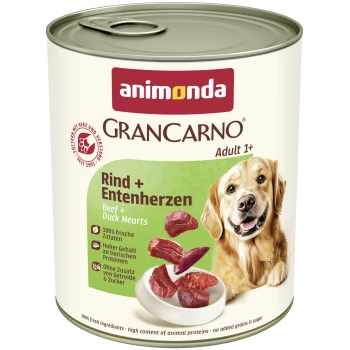 Puszka karmy dla psów Animonda GranCarno Adult 1+, Rind + Entenherzen (wołowina + serca kaczki), etykieta z kawałkami mięsa i wizerunkiem golden retrievera.