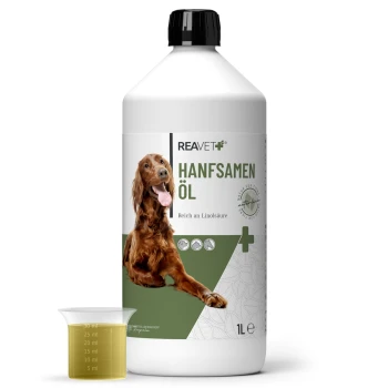 Hanföl naturrein 1L Flasche REAVET Hanföl Naturrein (1L) für Hunde, mit einem lächelnden Hund auf dem Etikett und einem Messbecher mit Öl.