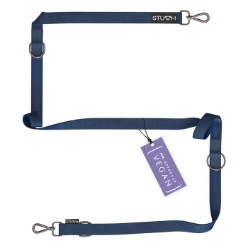 Eine blaue Haustierleine mit Metallclips und Ringen, mit einem Anhänger, der "PETA Approved Vegan" liest.