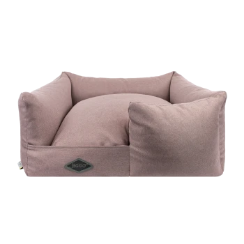Ein plüschiges, rechteckiges Haustierbett in einem sanften Rosa mit hohen, gepolsterten Seiten und einem zentralen Kissen, mit einem schwarzen "JEGGO"-Logo.