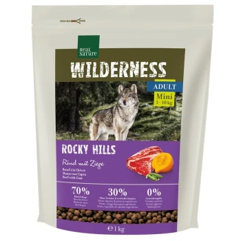 WILDERNESS Mini Rocky Hills Bœuf & Chèvre 1 kg Un sac de nourriture pour chiens Real Nature Wilderness, "Rocky Hills," avec un design de loup, 70 % de bœuf et de chèvre, 30 % de fruits et légumes, 0 % de céréales.