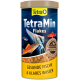 TetraMin Flakes Fischfutterbehälter mit bunten Fischillustrationen, mit dem Text "Gesunde Fische & klares Wasser."