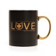 Schwarze Keramiktasse mit einem goldenen Griff, "LOVE" in goldenen Buchstaben, einer Katzensilhouette und einem Ahornblatt, beschriftet mit "Canadian Cat Company."