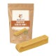 Wildfang Hartkäse Kaustab Bunky Hundekau-Stick, 100% natürlich, neben seiner Verpackung präsentiert, mit einem Wolf-Logo und Produktdetails.