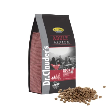 Dr. Clauder's Adult Medium Hundefutterbeutel in Schwarz und Rot, beschriftet mit "Adult Medium" und "Geflügel/Poultry", mit Futter vor sich.