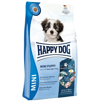 Happy Dog Mini Puppy Futterbeutel mit einem flauschigen Welpen auf der Vorderseite, der Wachstumsunterstützung und Vorteile für das Immunsystem auf Deutsch hervorhebt.