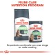 Afbeelding van Royal Canin huisdiervoeding: 'Care Digestive' droogvoer zak en 'Care Digest Sensitive' natvoer zakje, met 'Feline Care Nutrition Program.'