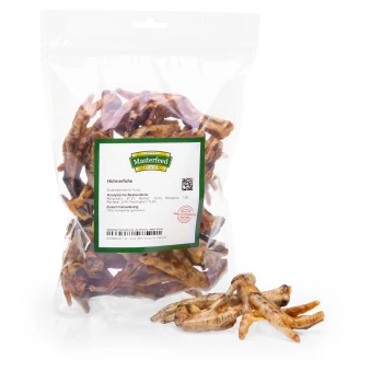 Getrocknete Hühnerfüße für Hunde in einer klaren Plastiktüte mit dem Etikett 'Masterfeed', das die Nährwertanalyse und Zutaten zeigt.