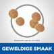 Bild von Hundefutter-Kibble-Stücken, ungefähr 4,5 x 9 mm, mit dem Text "Geweldige Smaak" deutlich angezeigt.