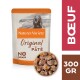Nourriture pour chiens Nature's Variety Original Pâté dans un emballage de 300g, présentant un bol de morceaux de viande, étiqueté "No Grain" et "Boeuf."