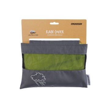 Grau Regenabdeckungstasche mit einem hellgrünen Netzbereich, beschriftet mit "RAIN COVER" auf einem Kartonuntergrund, mit einer Wolken- und Regengrafik.