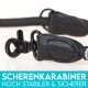 Schwarzer Haustierleinenclip mit robustem Design, mit dem Text "SCHERENKARABINER NOCH STABILER & SICHERER" darunter.