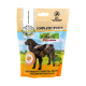 Bellfor Complete Snack Verpackung für Hunde, mit einer Hundesilhouette und Landschaft. Text: "100% getreidefrei," "Vollwertsnack," "Ergänzungsfutter."