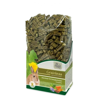 Eine durchsichtige Tüte mit JR Farm "Grainless" Kaninchenfutter für Zwergkaninchen, mit grünen Pellets und bunten Pflanzenmotiven.