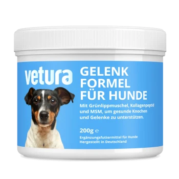 Weißer Behälter mit der Aufschrift 'vetura' 'GELENK FORMEL FÜR HUNDE' 200 g, Bild eines dreifarbigen Hundes, Gelenkpräparat, 'Hergestellt in Deutschland'.