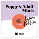 Produktetikett mit einer einzelnen kleinen Krokette im orangefarbenen Kreis; Text 'Puppy & Adult Minis', 'Kleine Kibbles', 'small', '10 mm'.