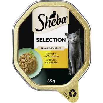 Karma dla kotów Sheba Selection w sosie, z kurczakiem i indykiem, opakowanie 85g, z wizerunkiem szarego kota na etykiecie.