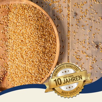 Herzförmige Anordnung kleiner, hellbrauner Samen auf einem weißen Hintergrund, mit einem goldenen "PREMIUM"-Banner in der oberen linken Ecke.