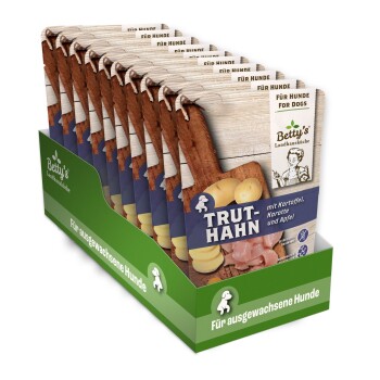 Hunde-Futterpräsentation mit Betty's Landhausküche TRUT-HAHN mit Kartoffeln, Karotten und Äpfeln, gekennzeichnet für erwachsene Hunde.