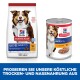 Die Verpackung von Hill's Science Plan Hundefutter zeigt einen lächelnden Hund. Links: Trockenfutter für reife Erwachsene 7+, rechts: Dosenfutter mit Huhn.