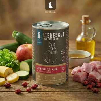 LIEBESGUT Dosen‑Kaninchenfutter ‚Kaninchen für Hunde‘ mit Gemüse, Apfel, rohem Fleisch und einer Ölflasche.