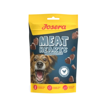 Josera Meat Hearts Hundeleckerli-Tüte mit begeistertem Hund und herzförmigen Snacks; Aufschrift: 'Weiche und schmackhafte Trainingssnacks'.