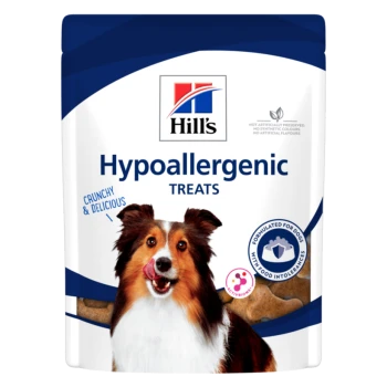 Hill's Hypoallergenic Treats Verpackung zeigt einen glücklichen Hund, der sich die Lippen leckt, mit "Crunchy & Delicious" und "Für Hunde mit Nahrungsmittelunverträglichkeiten."