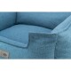 Helle blaue Haustierliege mit einem weichen, strukturierten Stoff und erhöhten Rändern, mit einem kleinen Trixie-Logo-Anhänger an der Seite.