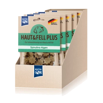 Hundeleckerlis in Sternform, präsentiert in einer Pappschachtel, beschriftet mit "HAUT&FELL PLUS" mit "Spirulina Algen," hergestellt in Deutschland.