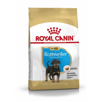 Royal Canin Puppy Rottweiler Hundefutterbeutel, mit einem Welpenbild, mit Text, der die ernährungsphysiologischen Vorteile für die Rasse und die Altersgeeignetheit hervorhebt.
