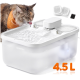Langhaarige Katze leckt aus weißem Feandrea 4,5 L Tierbrunnen; zwei Ersatzfilter abgebildet.
