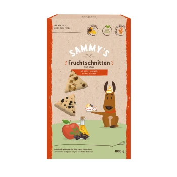 SAMY Krajanka owocowa 800 g Opakowanie plasterków owocowych Sammy's Fruchtschnitten z dwoma trójkątnymi plasterkami owoców, z napisem "z jabłkami i bzem" oraz rysunkowym psem.