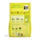 Sac vert-jaune de nourriture végétale pour chiens étiqueté « PHÉNOMÉNALES RECETTES VÉGÉTALES » avec photo de deux chiens et Edgard & Cooper.