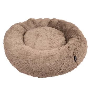 Rundes, plüschiges Haustierbett in einer sanften beigen Farbe, mit einem flauschigen Äußeren und einem gemütlichen, kreisförmigen Design.