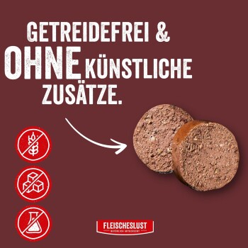 Zwei runde Fleischlaibchen mit Pfeil und großem Text 'GETREIDEFREI & OHNE KÜNSTLICHE ZUSÄTZE.', Symbolen für kein Getreide/keine Zusatzstoffe und 'FLEISCHESLUST'-Logo.