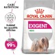 Sac de nourriture pour chien Royal Canin Exigent Mini avec une illustration de petit chien et le texte : "Satisfait les appétits difficiles" et "Préféré jusqu'à 99%".