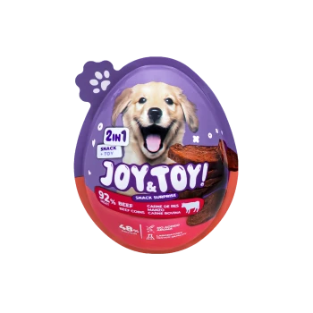 Lila eiförmige Haustiersnack-Verpackung mit fröhlichem Golden Retriever und Text „JOY & TOY!“, „2 in 1 Snack + Toy“, „92 % RIND“.