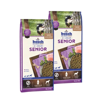 Bosch Senior-Hundefutterverpackung, mit zwei Säcken mit der Bezeichnung 'Senior' in lila Design, zeigt Kroketten und Zutaten wie Fleisch auf einem Holzbrett.