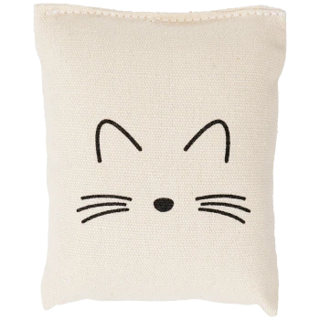 A small, cream-colored cushion featuring a simple, black cat face design with pointed ears and whiskers.