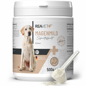 Behälter mit REAVET Magenmild-Pulver für Hunde, 500g, mit einem beigen und weißen Design mit einer Hundesilhouette und dem Etikett "Made in Germany."