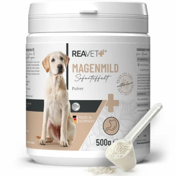 Behälter mit REAVET Magenmild-Pulver für Hunde, 500g, mit einem beigen und weißen Design mit einer Hundesilhouette und dem Etikett "Made in Germany."