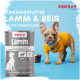 Dose Supravit-Hundefutter mit der Aufschrift 'Lamm & Reis, mit 97% purem Fleisch' neben einer Französischen Bulldogge im gelben Pullover.