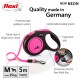Flexi retractable dog leash in neon pink, featuring an ergonomic grip, comfortable braking system, and a connection slot for a Multi Box.