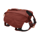 Ruffwear Hundewanderucksack in Rostfarbe, mit einem Reißverschlussfach, verstellbaren Riemen und einem Griff oben für einfaches Tragen.