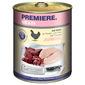 Canned "Premiere Meati" pet food with chicken, raw chicken breast, and meats on a cutting board with a knife and "for meat lovers" text.
