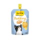 GimCat Pudding in blauer Tüte mit Katzenfoto und Löffel Pudding; Aufschrift '90% Vollmilch, laktose reduziert'.