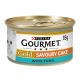 Purina Gourmet Gold Savoury Cake with Tuna cat food can, 85g, featuring a white cat image on the label.