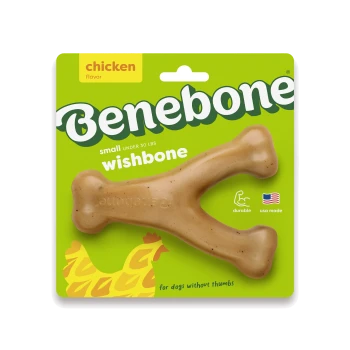 A rubber dog chew toy shaped like a bone, featuring a textured surface and a light brown color with speckles.